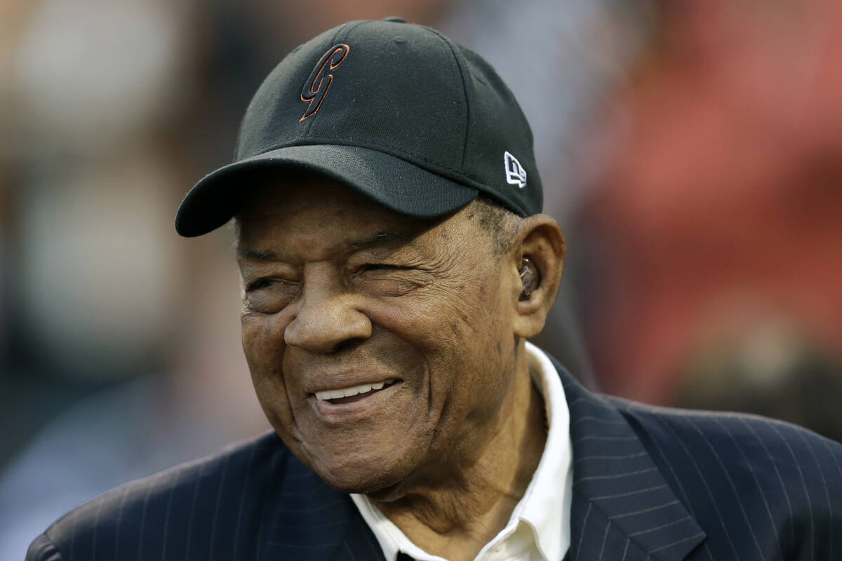 FILE - Baseball legend Willie Mays smiles prior to a game between the New York Mets and the San ...