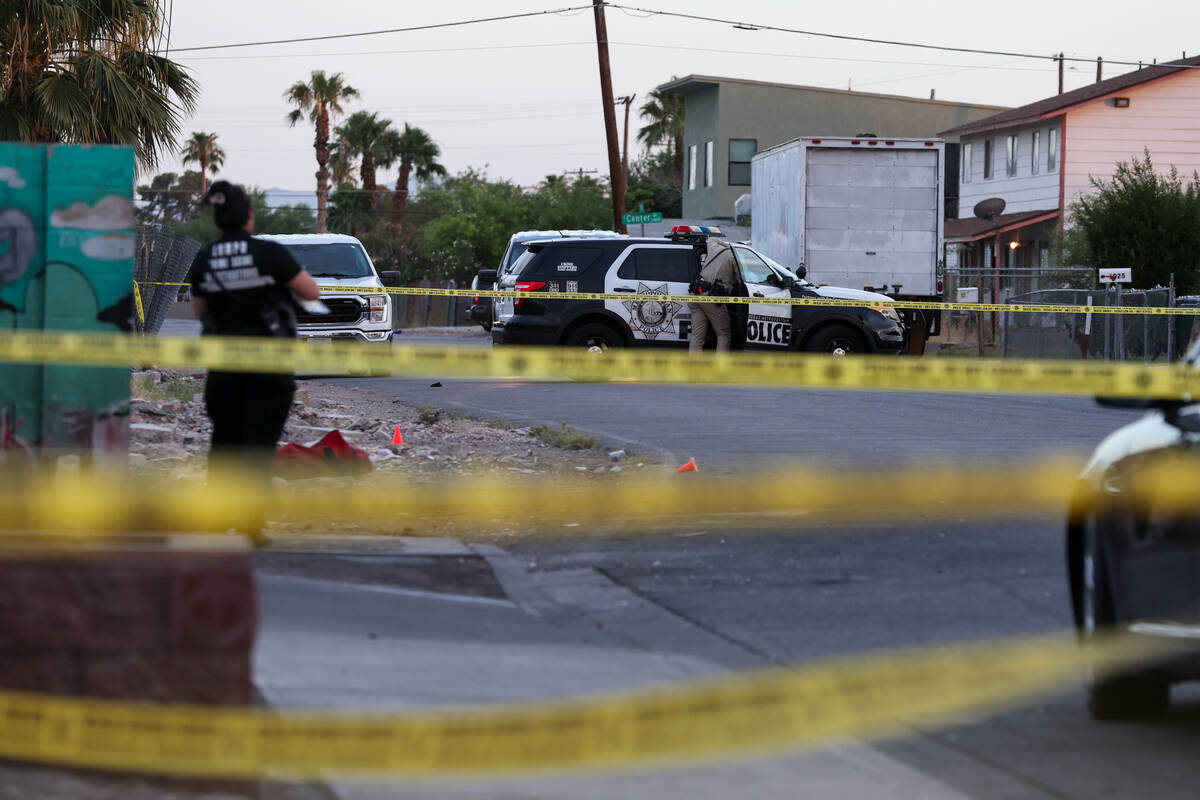 Metropolitan police investigate a homicide near the intersection of East Charleston Boulevard a ...