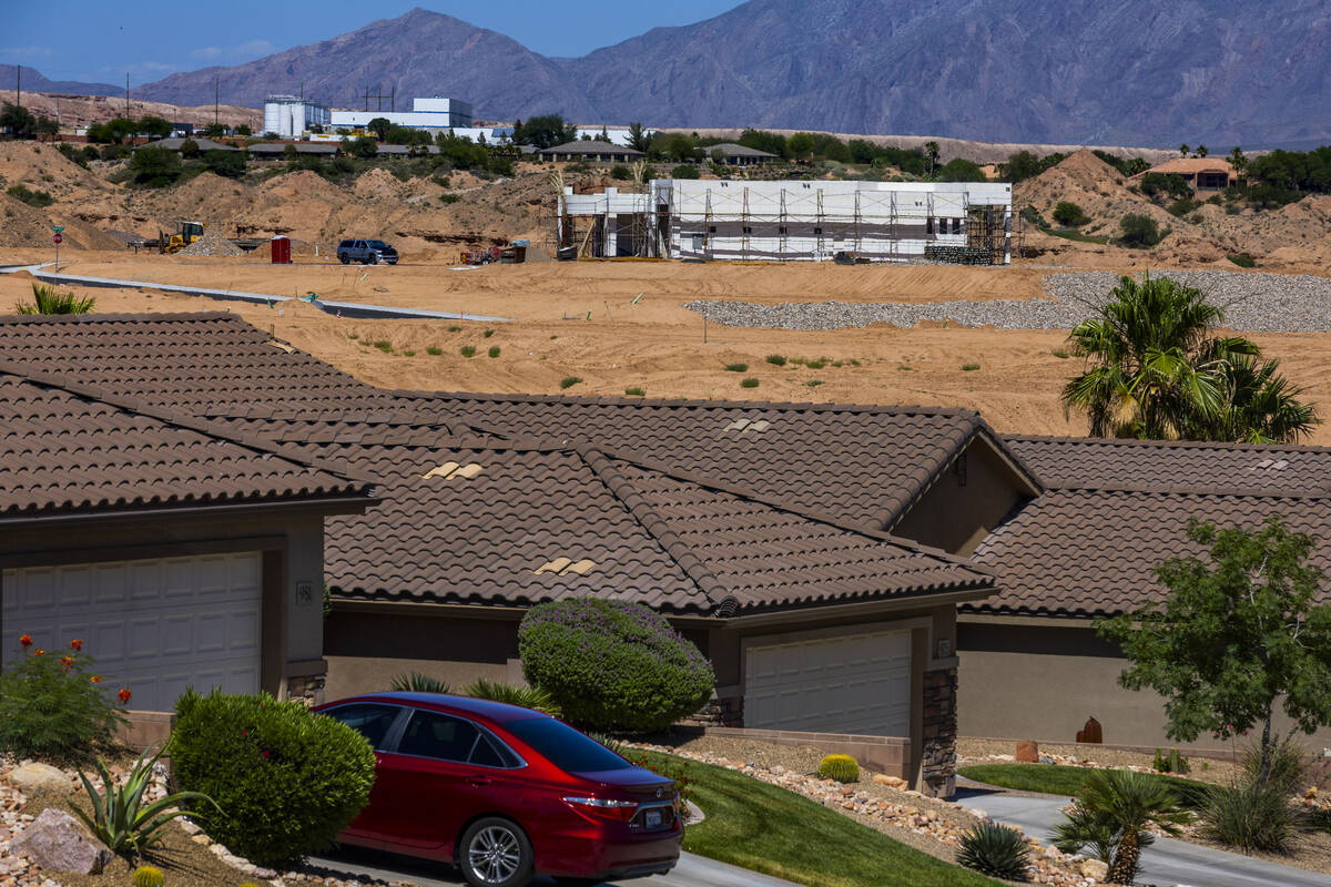 A home is built near exiting homes as housing construction is at a rapid pace while the city gr ...