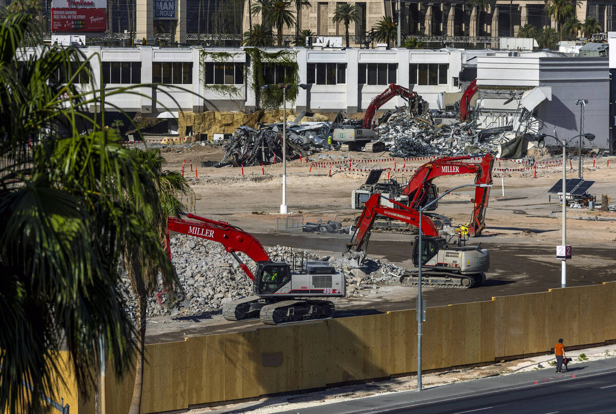 Piles of concrete and scrap metal are to be transported away as demolition continues on the Tro ...