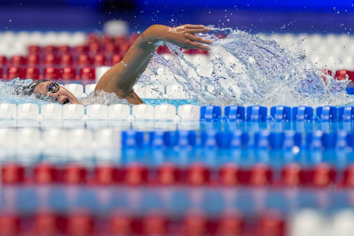 Katie Grimes swims during a women's 1,500-meter freestyle preliminary heat Tuesday, June 18, 20 ...