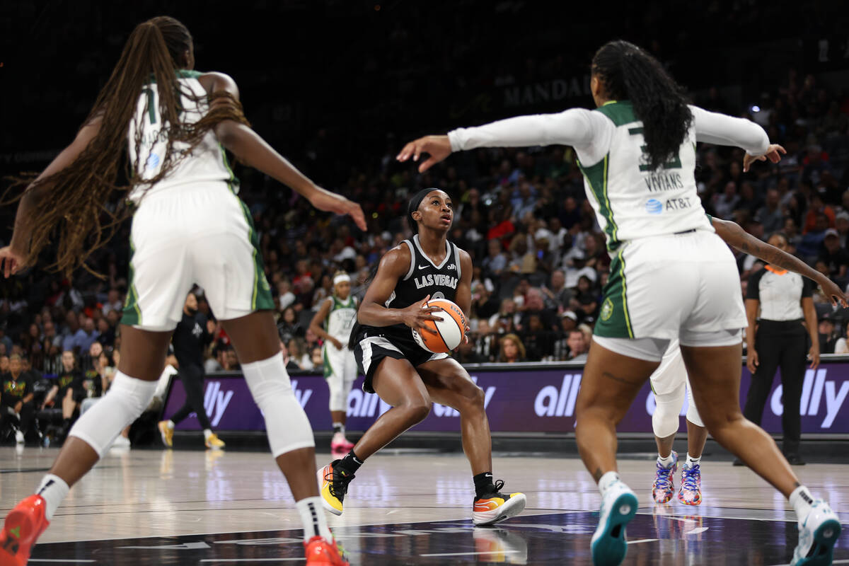 Las Vegas Aces guard Jackie Young (0) looks to shoot against the Seattle Storm during the secon ...