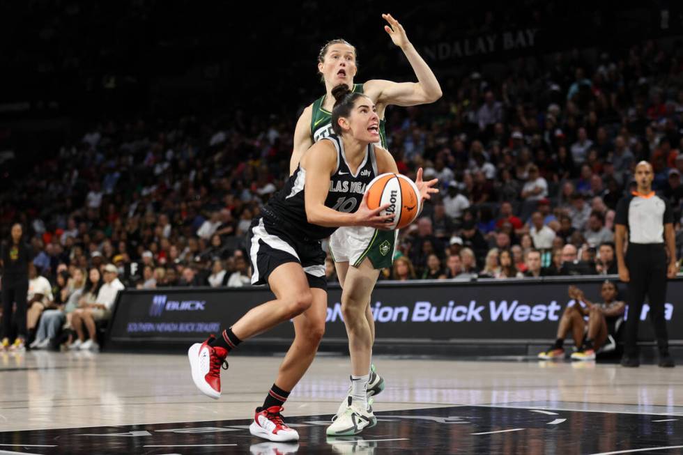 Las Vegas Aces guard Kelsey Plum (10) shoots against Seattle Storm guard Sami Whitcomb during t ...