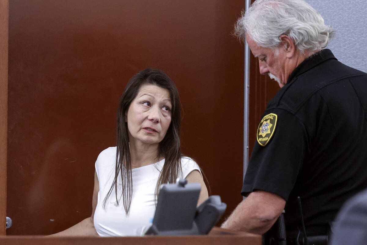 Pamela Bordeaux asks a marshal if she could be handcuffed out of view after being found guilty ...