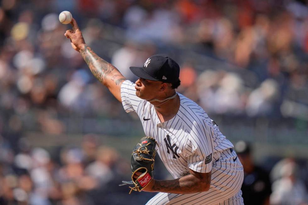 New York Yankees' Luis Gil pitches during the first inning of a baseball game against the Balti ...