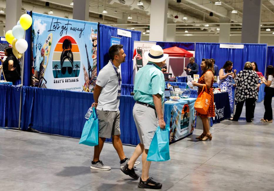 Expogoers check out booths at The Expo at World Market Center during a small business expo, Wed ...