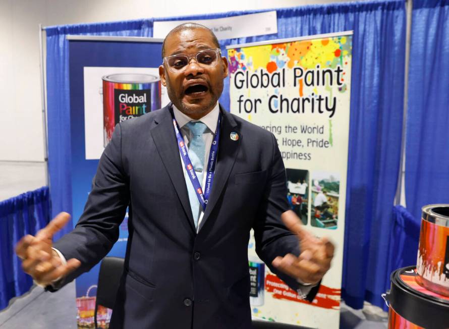 Rony Delgarde, fonder president of Global Paint for Charity, speaks during an interview with th ...