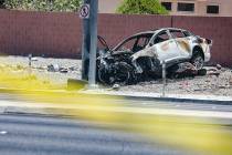 The scene where a woman died in a single car fatal crash near the 215 Beltway in Las Vegas, Sun ...