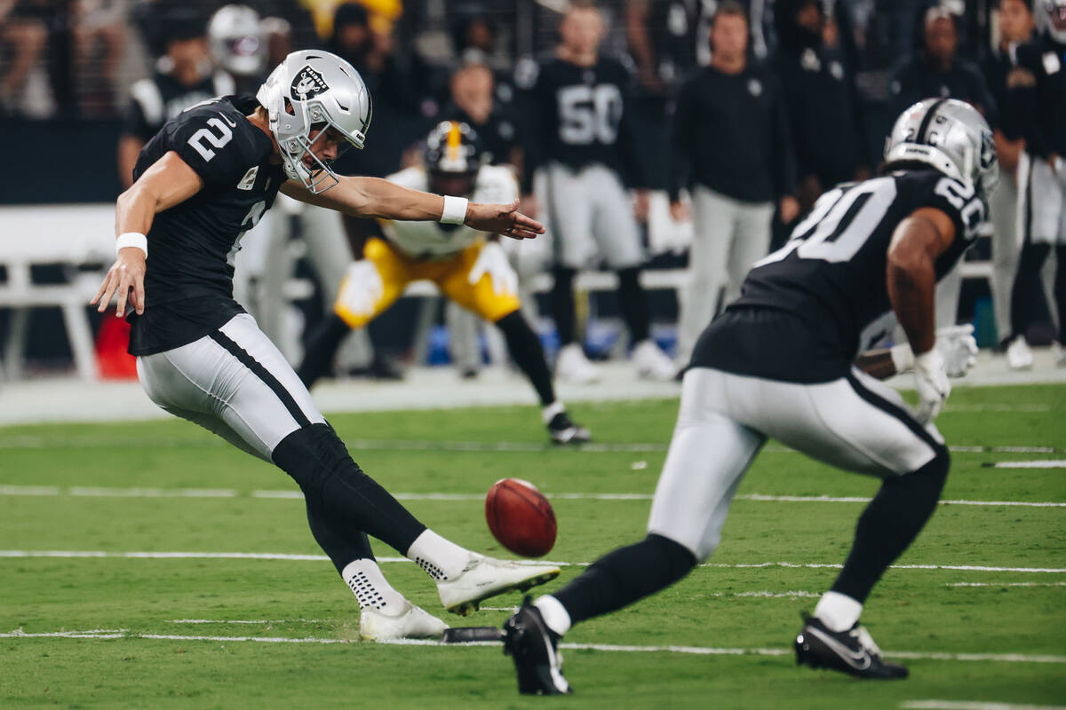 Raiders place kicker Daniel Carlson (2) kicks the ball during the second half of a game against ...