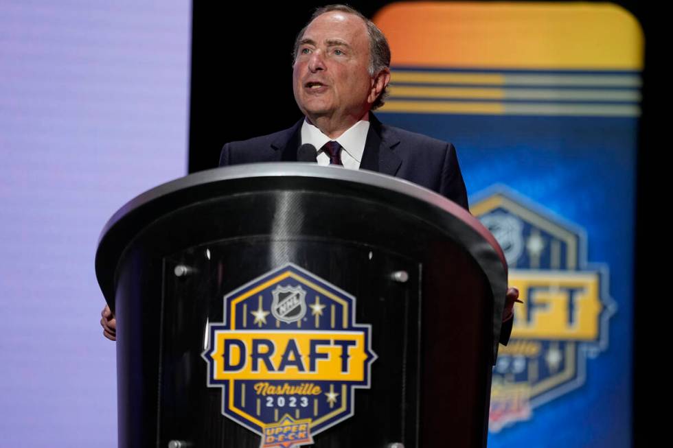 FILE - NHL commissioner Gary Bettman delivers remarks during the first round of the NHL hockey ...