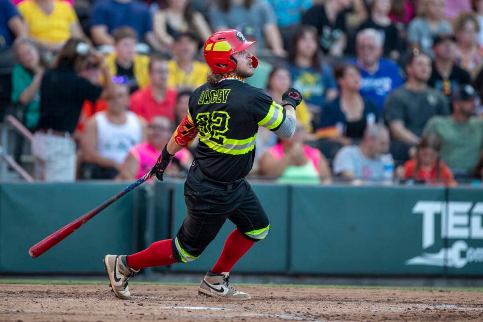The Firefighters’ Logan Lacey (32) hits the ball during the game against the Party Anima ...