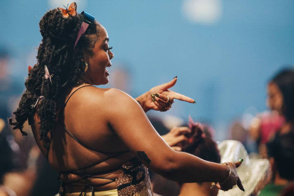 Fans dance to music before Megan Thee Stallion takes the stage during the Hot girl Summer Tour ...