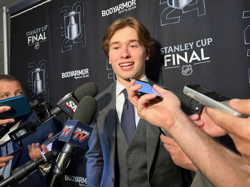 Macklin Celebrini, the expected No. 1 pick in the NHL draft to the San Jose Sharks, speaks with ...