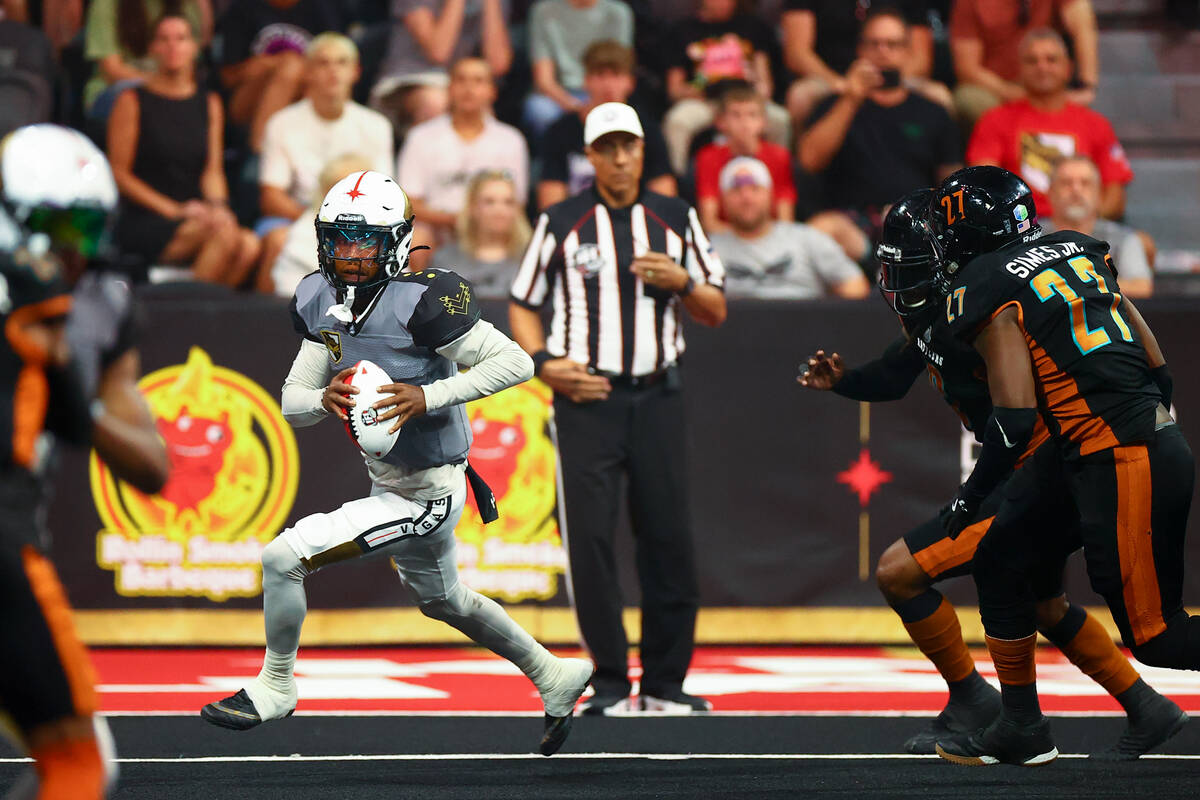 Vegas Knight Hawks quarterback Ja'Rome Johnson carries the ball up the field during an IFL (Ind ...