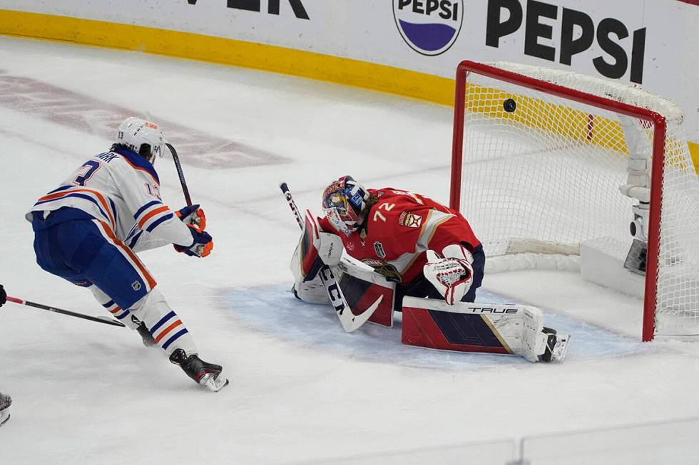 Edmonton Oilers center Mattias Janmark (13) scores against Florida Panthers goaltender Sergei B ...