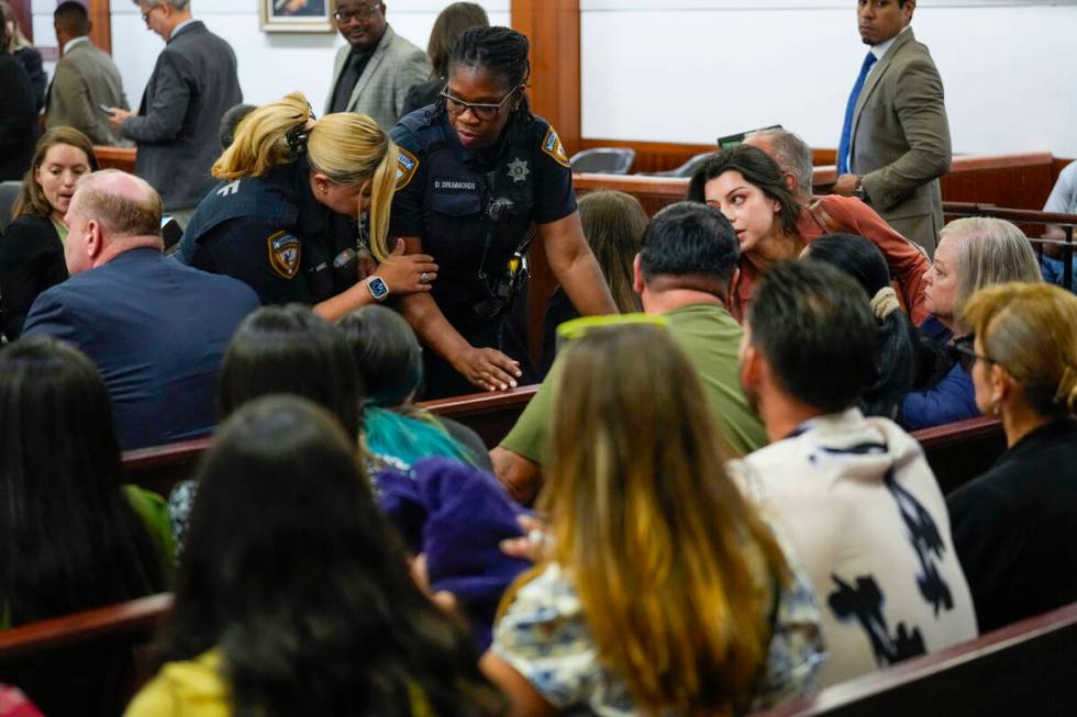 Deputies comfort family members of 12-year-old Jocelyn Nungaray, after one of her accused kille ...