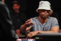 Phil Ivey competes during the final table of the $10,000 buy-in Limit 2-7 Triple Draw Champions ...