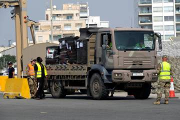 A truck carrying Gaza aid is about to enter a U.S ship, at the port of Larnaca, Cyprus, Wednesd ...
