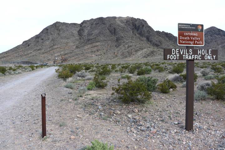 The sign marking the trail leading to Devils Hole in Death Valley National Park is seen on Apri ...