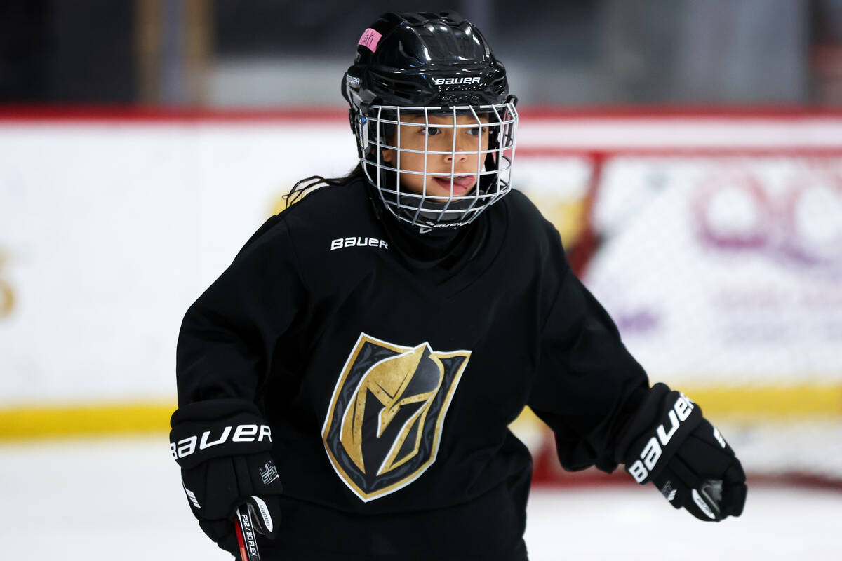 A young hockey player skates during the NHL Draft Prospect Youth Hockey Clinic at City National ...