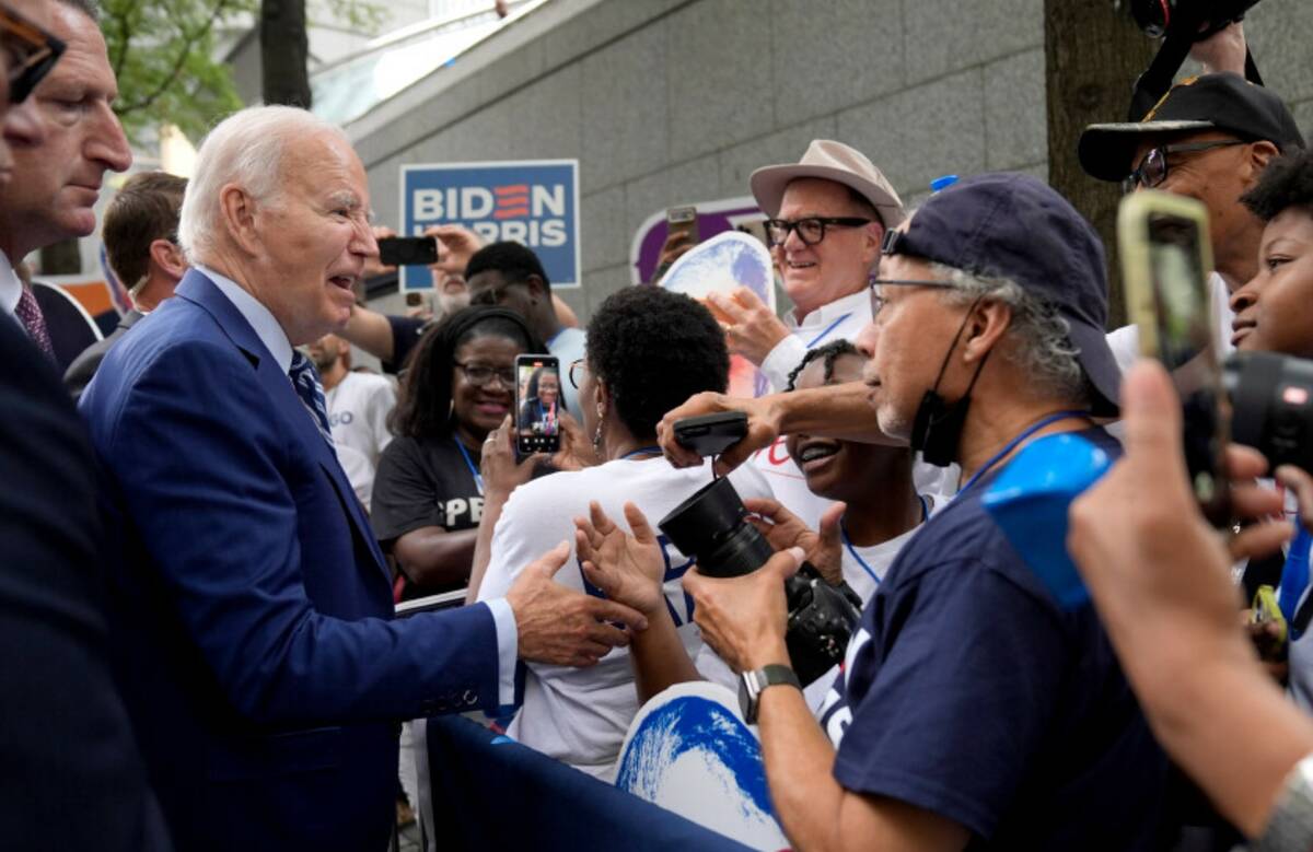 President Joe Biden, left, greets supporters, Thursday, June 27, 2024, in Atlanta, Ga., before ...