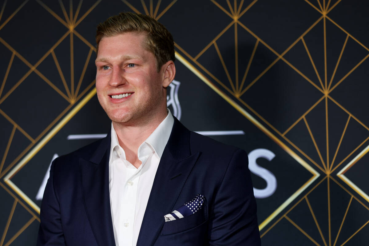 Colorado Avalanche center Nathan MacKinnon poses on the red carpet before the NHL Awards at Fon ...