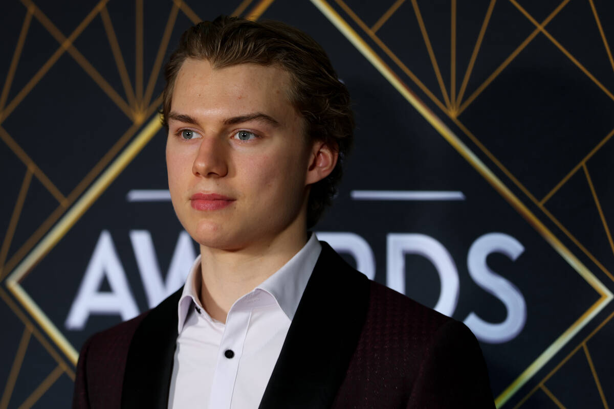 Connor Bedard, the 2023 No. 1 draft pick, poses on the red carpet before the NHL Awards at Font ...