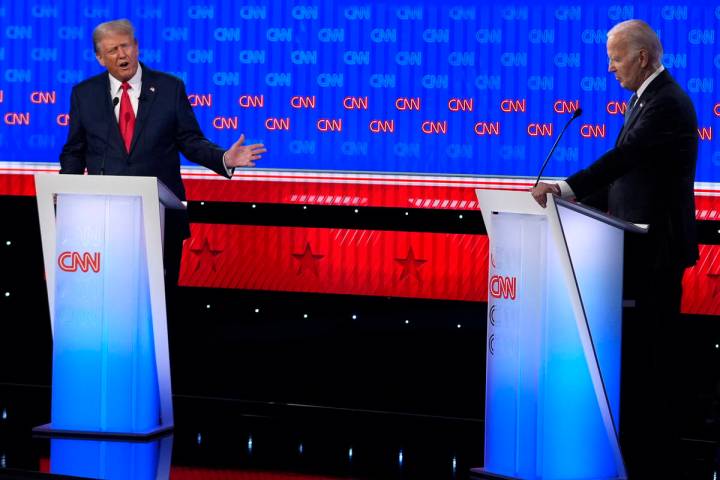 Former President Donald Trump, left, and President Joe Biden participate in a presidential deba ...