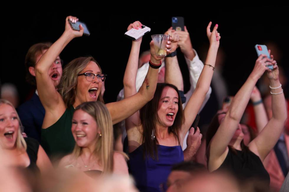 Fans cheer as the Edmonton Oilers select Sam O’Reilly 32nd overall after making a trade ...