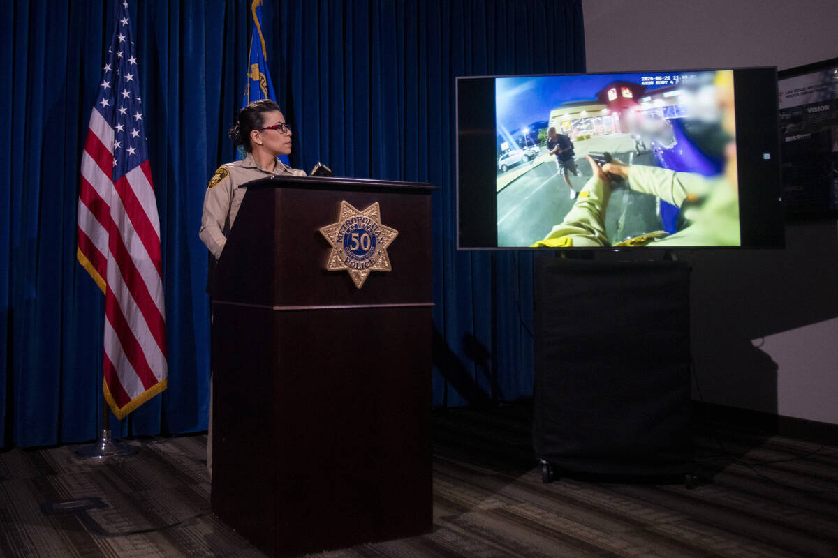 Assistant Sheriff Yesenia Yatomi watches body camera footage during a media briefing about an o ...