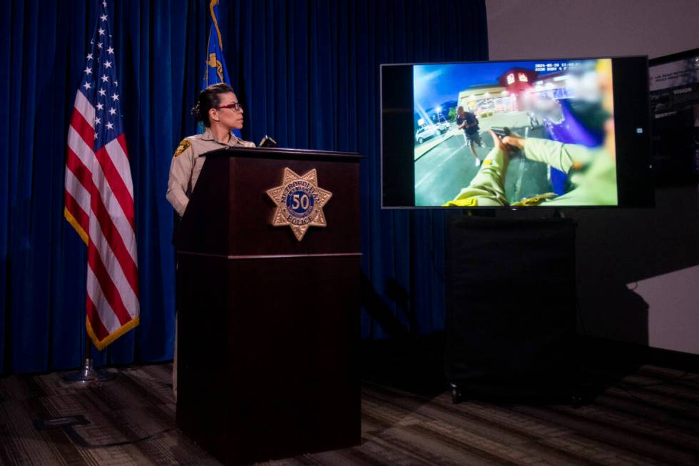 Assistant Sheriff Yesenia Yatomi watches body camera footage during a media briefing about an o ...