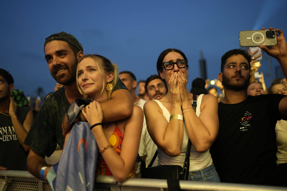 A woman weeps at the Nova Healing Concert in Tel Aviv, Israel, on Thursday, June 27, 2024. This ...
