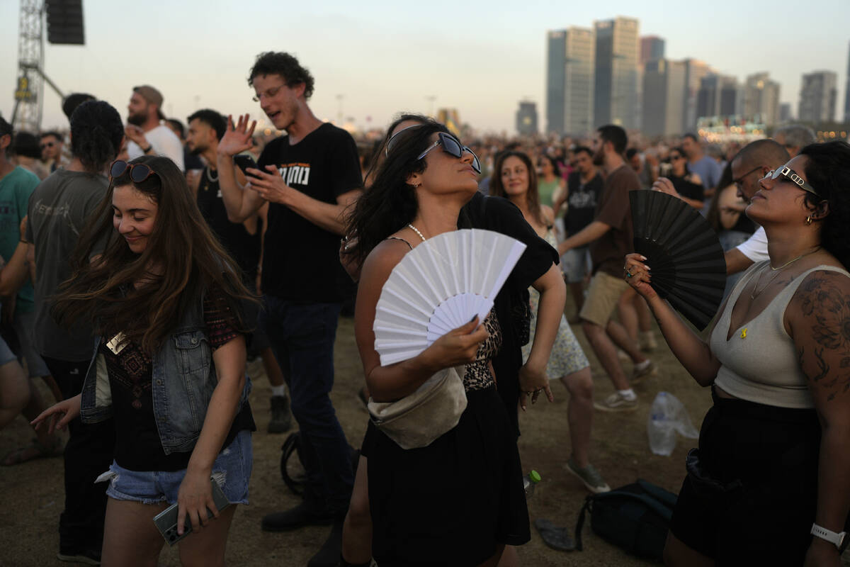 People dance the Nova Healing Concert in Tel Aviv, Israel, on Thursday, June 27, 2024. This wa ...