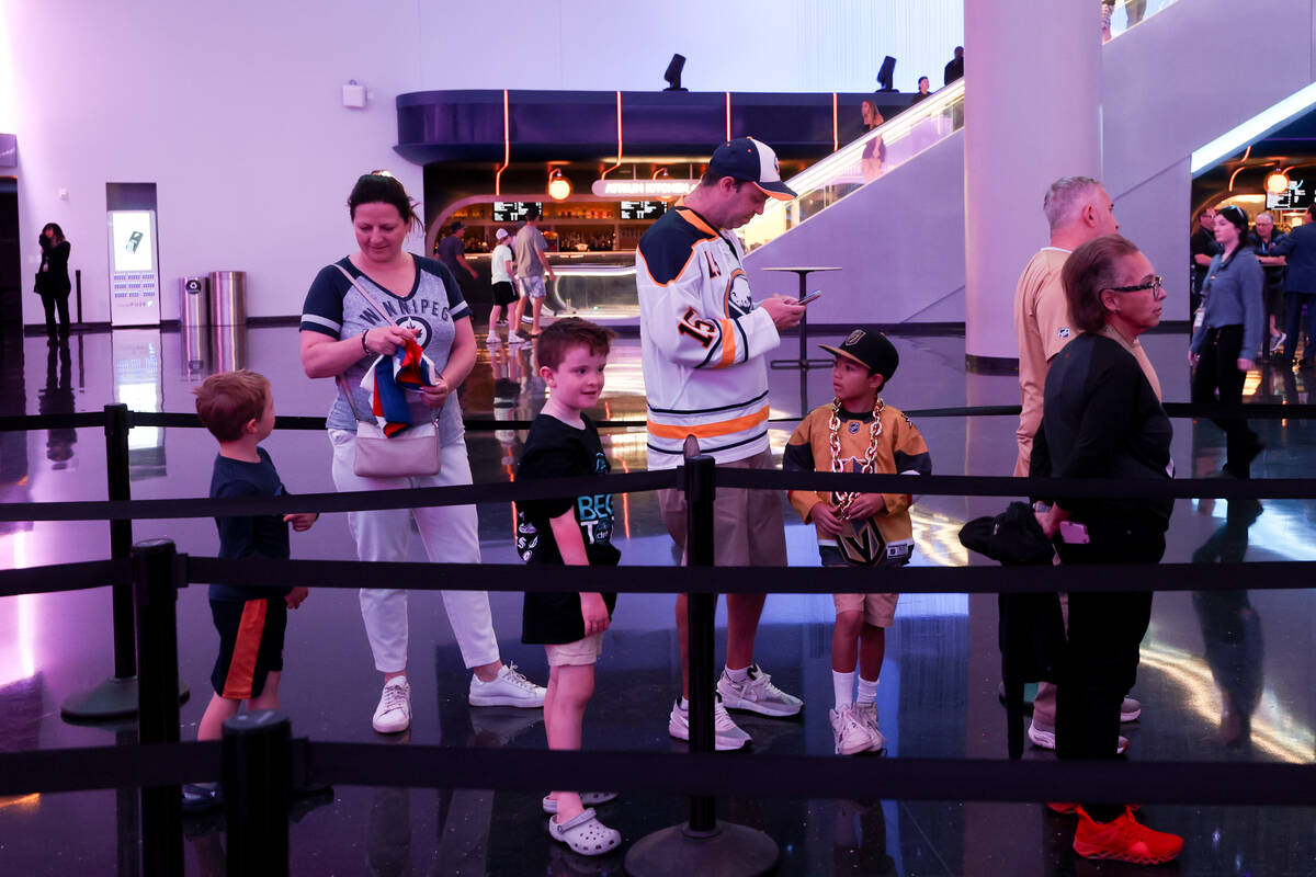 Fans wait in line to pose for photos during the NHL hockey draft at Sphere on Saturday, June 29 ...