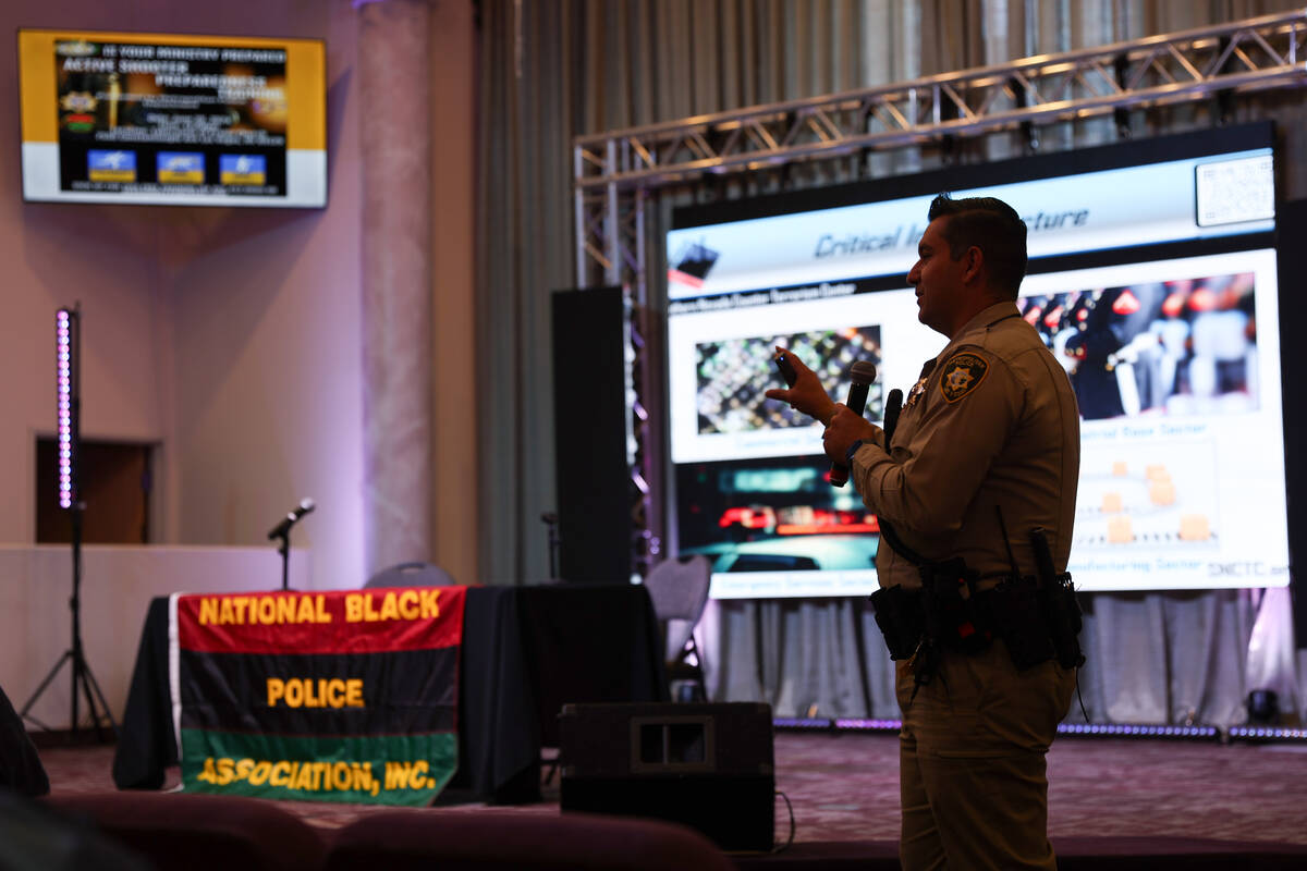 Metropolitan Police Department officer Michael Childs gives a presentation during an active sho ...