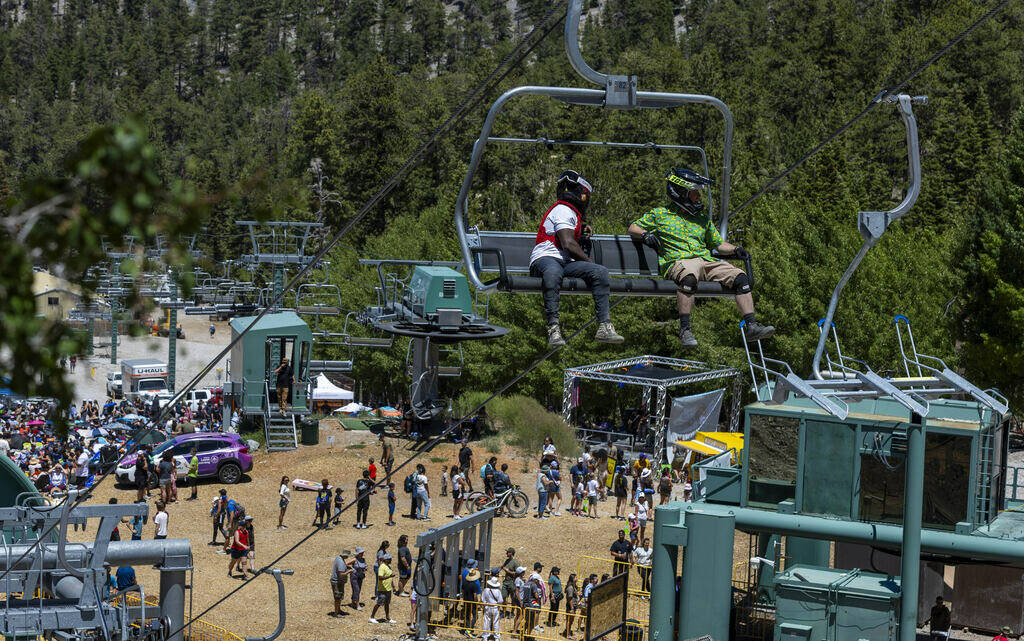 Mountain bikers check out the scenery on their way up during the Mountain Fest on Rabbit Peak a ...