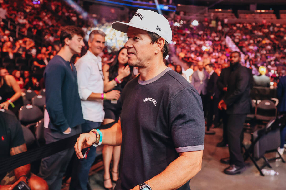 Actor Mark Wahlberg greets other attendees at UFC 303 at T-Mobile Arena on Saturday, June 29, 2 ...