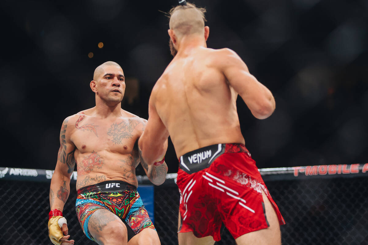 Alex Pereira kicks Jiri Prochazka during their light heavyweight title bout at UFC 303 at T-Mob ...