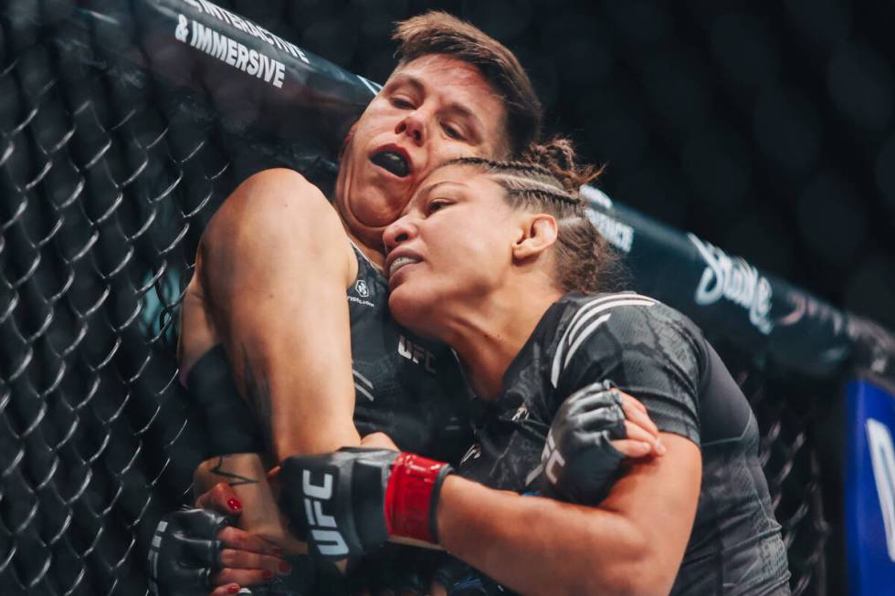 Mayra Bueno Silva, right, fights Macy Chiasson during the bantamweight bout at UFC 303 at T-Mob ...