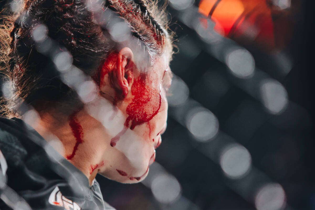 Mayra Bueno Silva is bloodied by Macy Chiasson during the bantamweight bout at UFC 303 at T-Mob ...