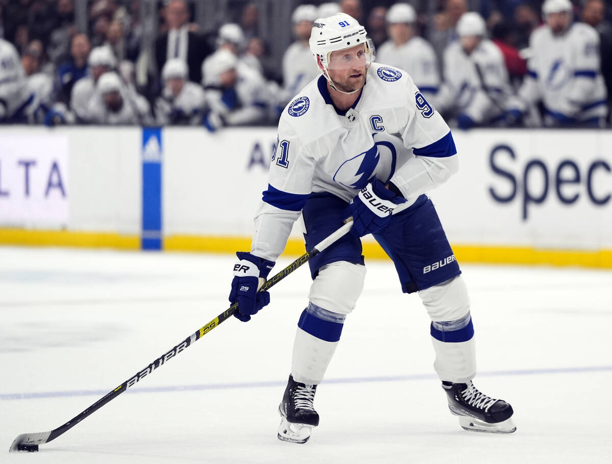 Tampa Bay Lightning center Steven Stamkos moves the puck during the third period of an NHL hock ...