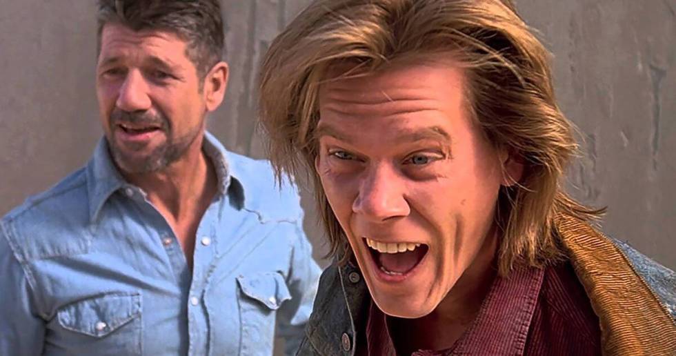 Fred Ward, left, and Kevin Bacon in a scene from "Tremors." (Universal Pictures)