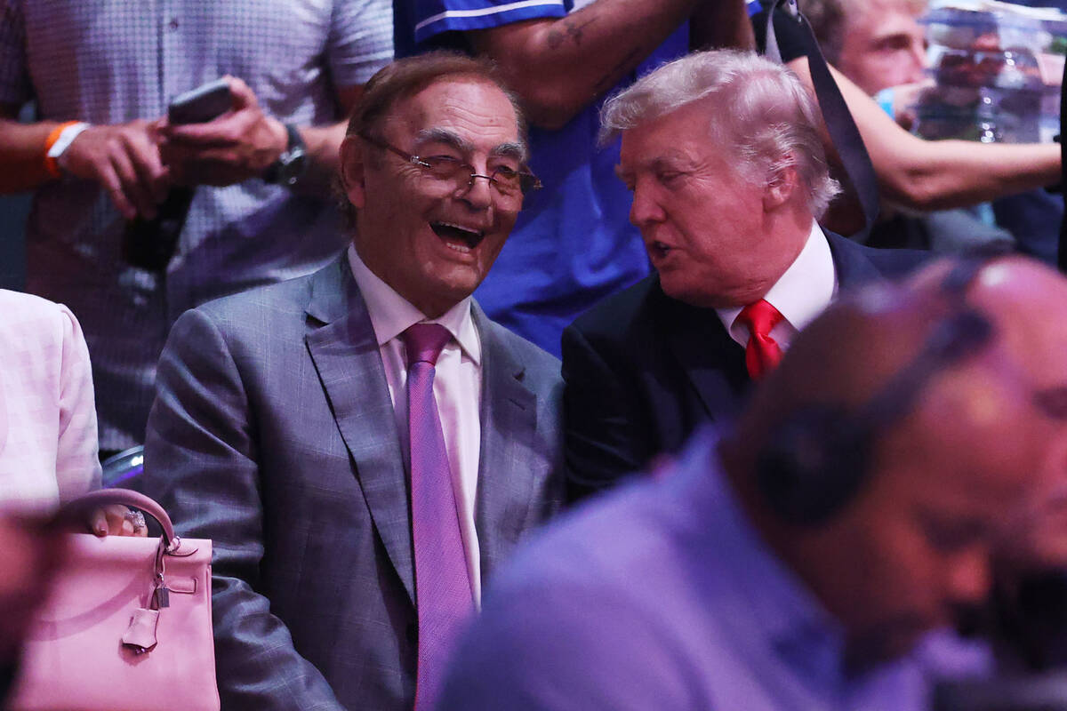 Casino owner Phil Ruffin and former president Donald Trump attend the UFC 264 event at T-Mobile ...