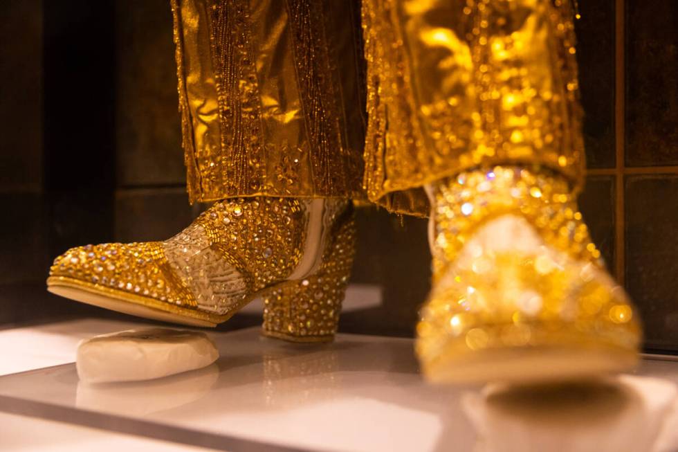 Boots and gold lame pants are seen during a tour of the Liberace Museum Collection at Thriller ...