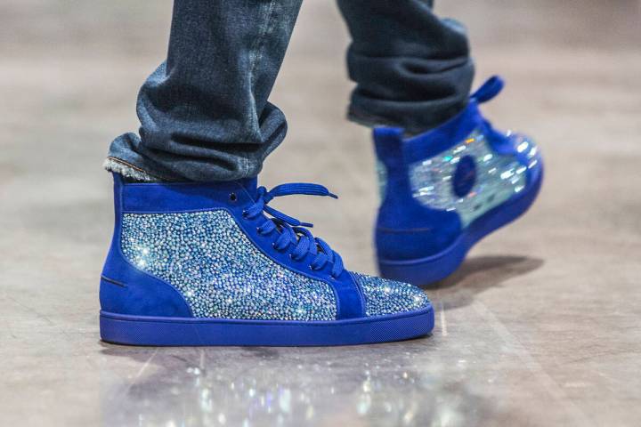 Cordero Brady, aka "CJ so Cool" sports his custom kicks during Sneaker Con at the Las Vegas Con ...