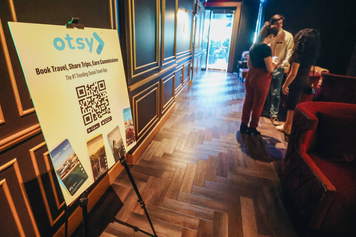 A board for Otsy, a travel booking and social media app founded by Michael DeLucca, sits out du ...