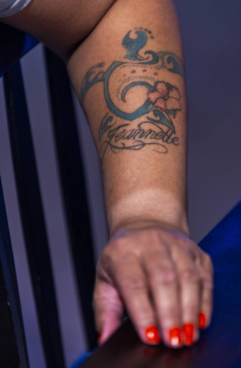 A tattoo on Sherlyn Faria's arm honors her daughter Jeannette Faria, one of the victims of Eric ...