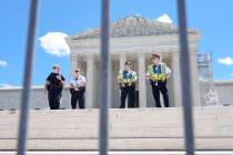 Supreme Court Police officers stand outside the Supreme Court Monday, July 1, 2024, in Washingt ...