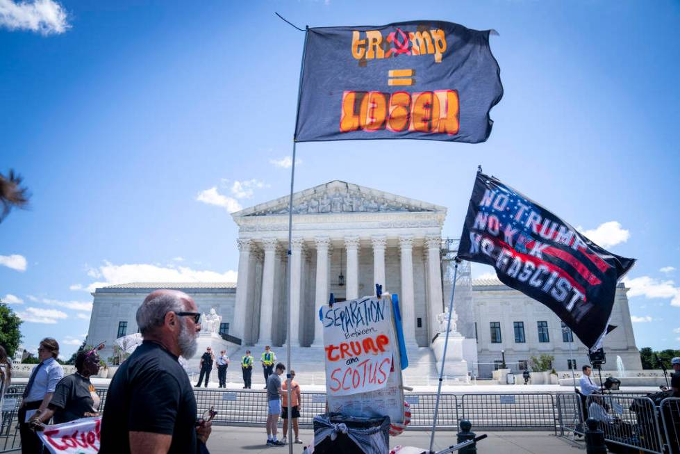 People protest outside of the Supreme Court, Monday, July 1, 2024, after court decisions were a ...