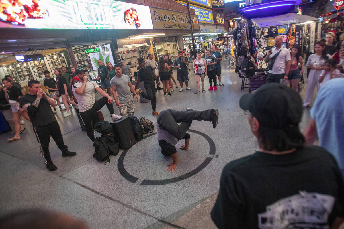 A group of buskers perform at the Fremont Street Experience Monday, July 1, 2024, in Las Vegas. ...